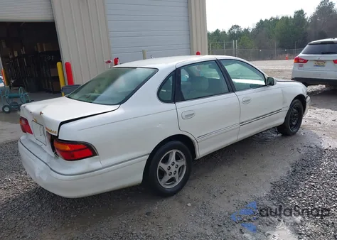 1999 Toyota Avalon Xls z USA, uszkodzony, nr VIN 4T1BF18B0XU301241